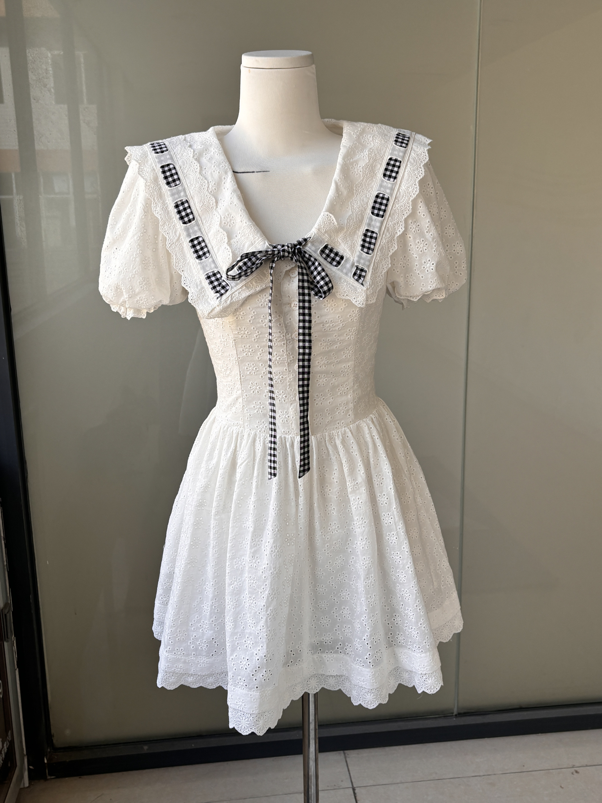 Navy Puff Sleeve Dress with French Bow Tie Strap and Waist-Cinching Design - Everyday Heavy Industry Style