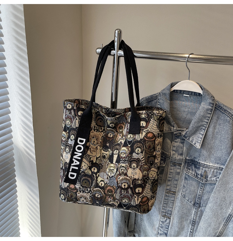 Women’s Niche Cartoon Canvas Tote Bag – Large Capacity Spring 2025 Commuter Shoulder Bag for Students